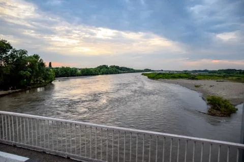 Passing over the bridge over river. The landscape of the river, the surface a Stock Photos