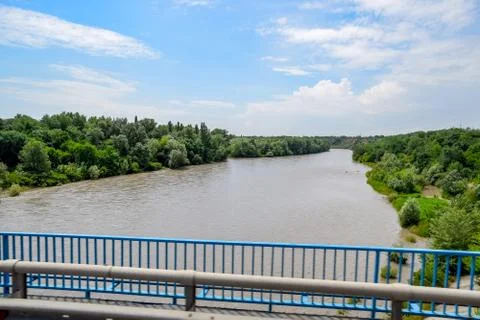 Passing over the bridge over river. The landscape of the river, the surface a Stock Photos