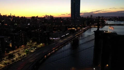 Passing over Brooklyn bridge viewing American flag at night Video stock 172459482
