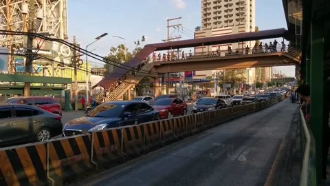 Passing Private Vehicles on a Separate Lane in Manila Philippines Stock Footage 237410479