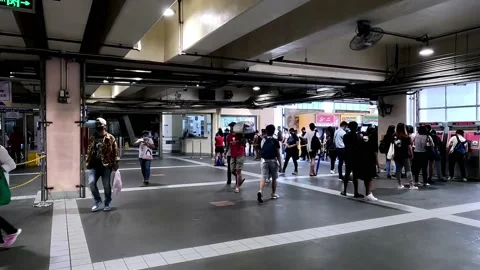 Passing Public Commuters on MRT 3 Cubao Station Philippines Stock Footage 234371375