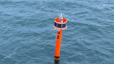 Passing by Red Buoy Beacon Floating on Baltic Sea Stock Footage 116409860