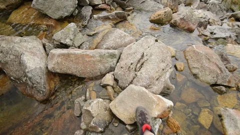 Passing a river on a mountain trail in the Tatra Stock Footage 94114554