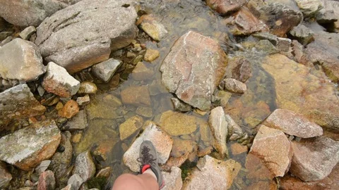 Passing a river on a mountain trail in the Tatra Stock Footage 94115523