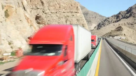 Passing road construction and semi trucks Stock Footage 57638496