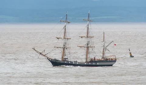 Passing sailing ship Stock Photos