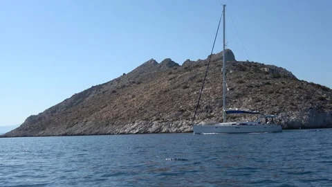 Passing by a sailing yacht Stock Footage 218254868