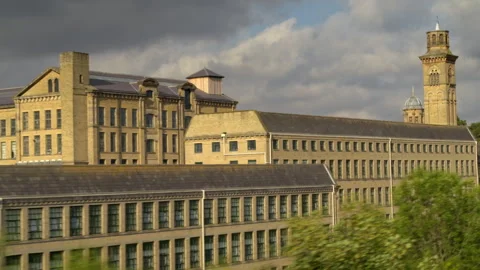 Passing Salts Mill historical building in Saltaire, England Stock-Footage 336798767