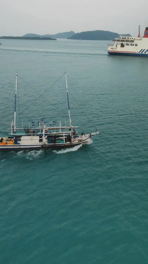 Passing small boat portrait Stock-Footage 242677798