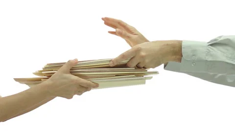 Passing Stack File Folders Bit By Bit Stock Footage