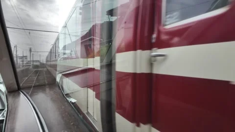 Passing a Stationary Train Stock Footage 323911275