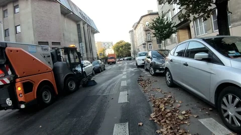 Passing by a sweeper Video stock 163742105