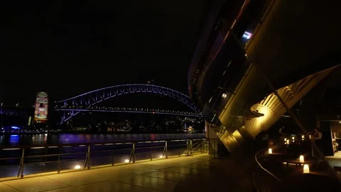 Passing Sydney Opera House dining towards Harbour Bridge 6K Stock Footage 311140806