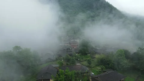 Passing through the clouds to reach Tianchi Miao Village 2 Stock Footage 252356439