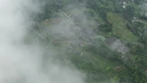 Passing through the clouds to reach Tianchi Miao Village 4 Stock Footage 252358331