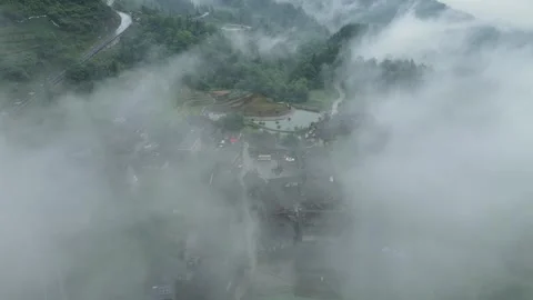 Passing through the clouds to reach Tianchi Miao Village. Stock Footage 252358388