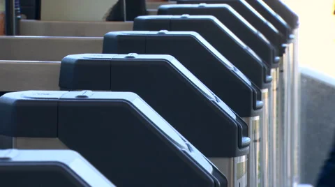 Passing Through Turnstiles at a Train Station Stock Footage 61483909