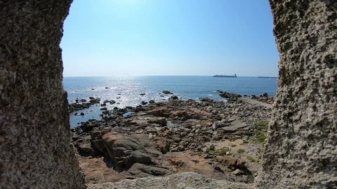 PASSING THROUGH A WINDOW TO SEE THE OCEAN Stock Footage 94759710