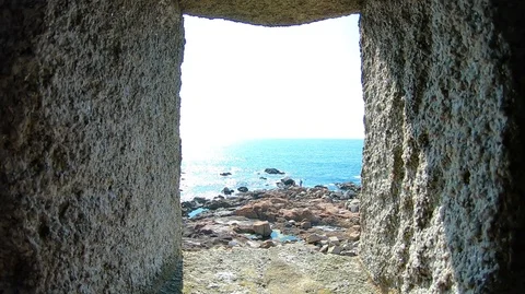 PASSING THROUGH A WINDOW TO SEE THE OCEAN Stock Footage 94759720