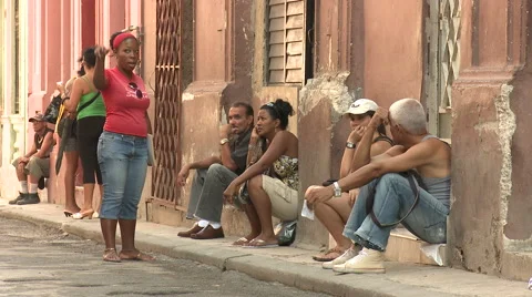 Passing the time of day, talking and people watching Stock Footage 39994799