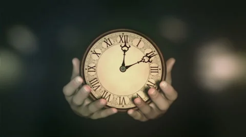 Passing of time. Hands holding fast turning clock. Natural grading version. Stock Footage 44565898