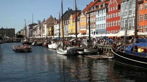 Passing tour boat (left to right) in Nyhavn, Copenhagen Stock Footage 11830012