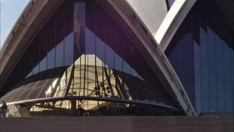 Passing tourists time lapse shift tilt and Sydney Opera House 4K Stock Footage 201658731