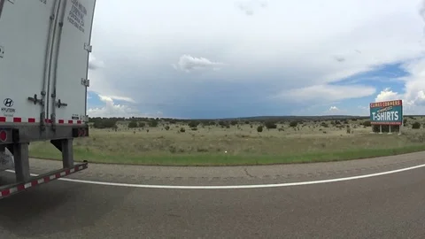 Passing by tractor trailer on highway Stock Footage 71088734