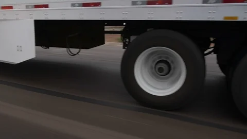Passing a tractor trailer on an interstate highway Stock Footage 92087475