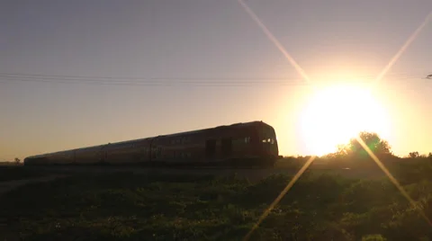 Passing train on sunset Stock Footage 35164450