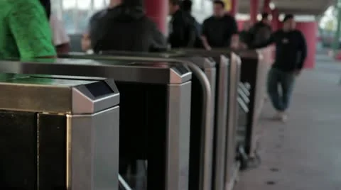 Passing a turnstile access Stock Footage