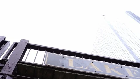 Passing under bridge in Chicago during St Patrick's Weekend Stock Footage 150671177