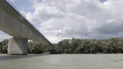 Passing under a bridge in front of the city of Melk on the Danube Stock Footage 115902257