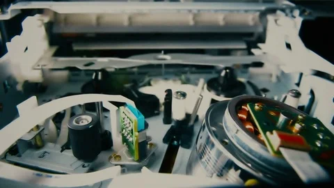 Passing of a videotape in the videorecorder a close up Stock Footage 81402495
