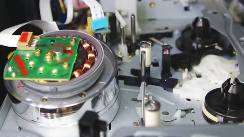 Passing of a videotape in the videorecorder a side view Video stock 81402480