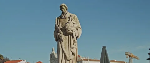 Passing a white stone religious statue Stock Footage 151354798