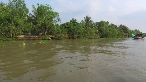 Passing workboats on the Mekong River Stock Footage 73282245