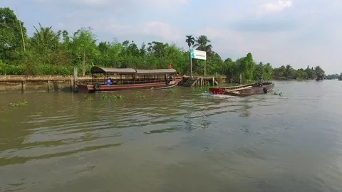 Passing workboats on the Mekong River Stock Footage 73282632