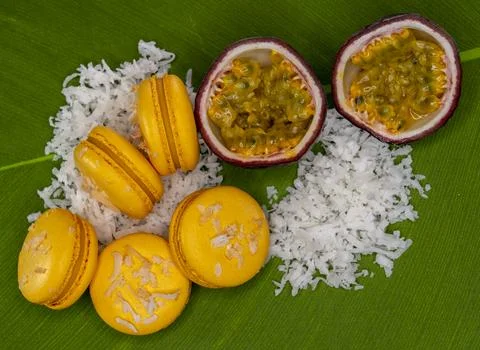 Passion fruit macaroons in tropical background  2 Stock Photos