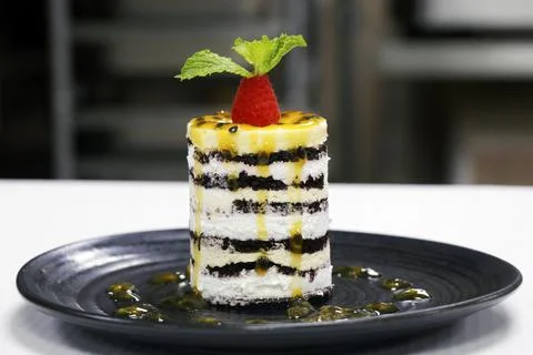 Passion fruit mousse cake with layer of chocolates Stock Photos