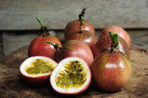 Passion fruit on old wooden table. Stock Photos