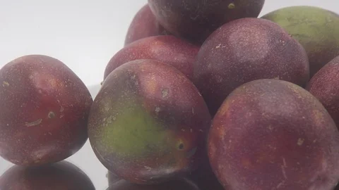 Passion fruit rotating on white background Stock Footage 126111732