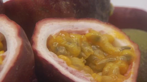 Passion fruit rotating on white background Stock Footage 126112328