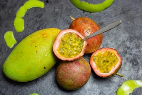 Passion fruit with spoon Stock Photos