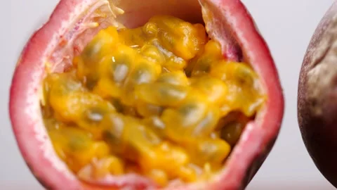 Passion Fruit with transition shot from outside to inside of passion fruit Stock Footage 142915004