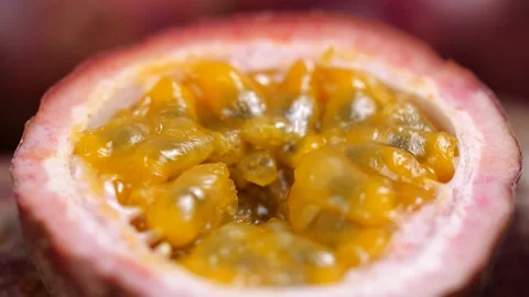 Passion fruit turning in slow motion Stock Footage 143752837
