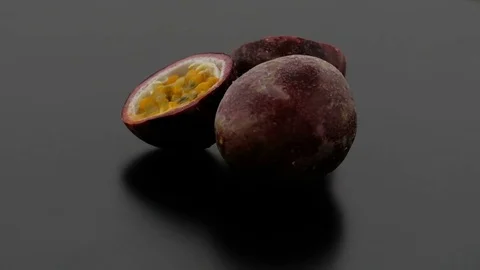 Passion Fruit on Turntable - Black Background Stock Footage 75860477