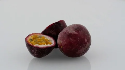 Passion Fruit on Turntable - White Background Stock Footage 75860388