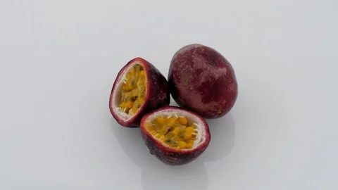 Passion Fruit on Turntable - White Background Stock Footage 75860547