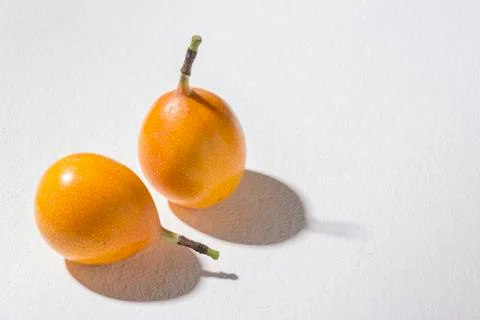 Passion fruit on white background - Passiflora ligularis Stock Photos
